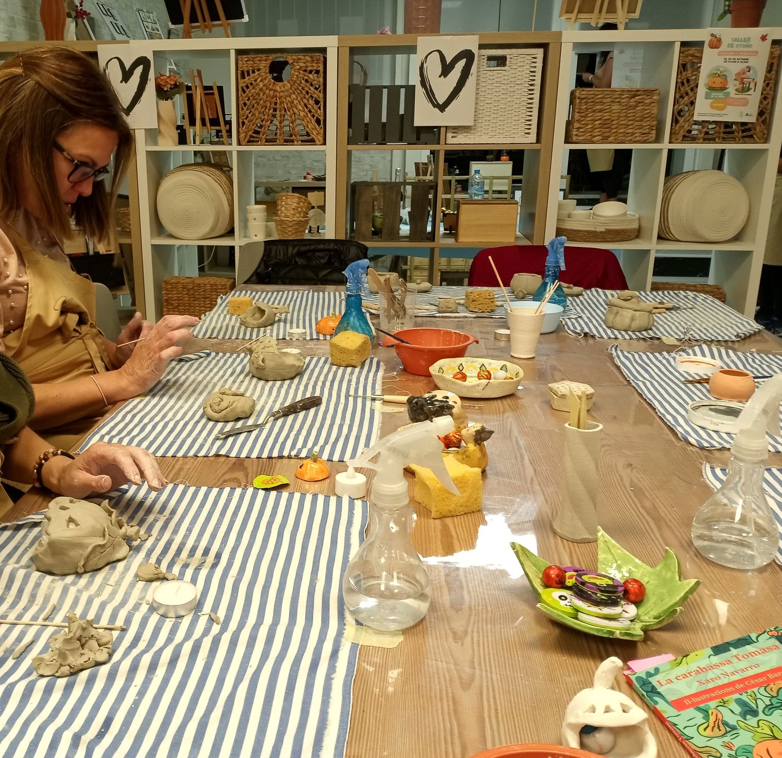 Participants making ceramics during the second workshop